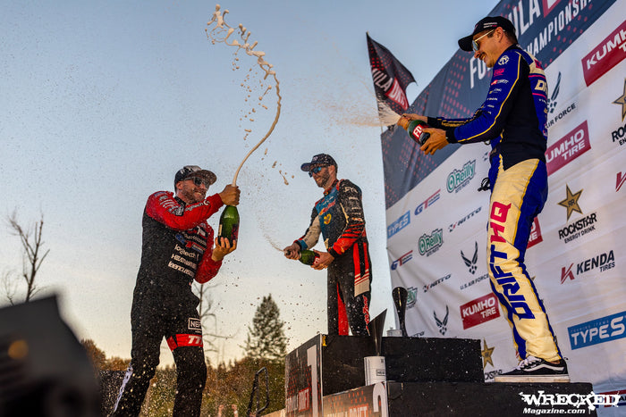 Matt Field, James Deane, and Adam LZ celebrating on the podium