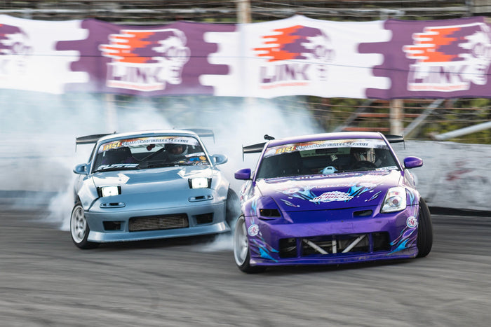 Clint Stotts follows close behind Neil Dellaria at Drift Indy Street League Round One. NA Miata vs 350Z Drifting